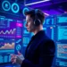 Security analyst wearing a headset monitoring multiple screens with charts and alerts demonstrating how audit secure wordpress ddos protection