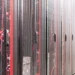 Rows of secure server racks with visible red network cables showcasing ModularDS vs BackupBuddy: Which Backup Solution Reigns Supreme?
