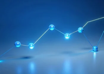 A stylized blue line graph of glowing connected spheres on a reflective surface representing performance metrics, ModularDS vs Pingdom: Discover the Ultimate Performance Showdown!